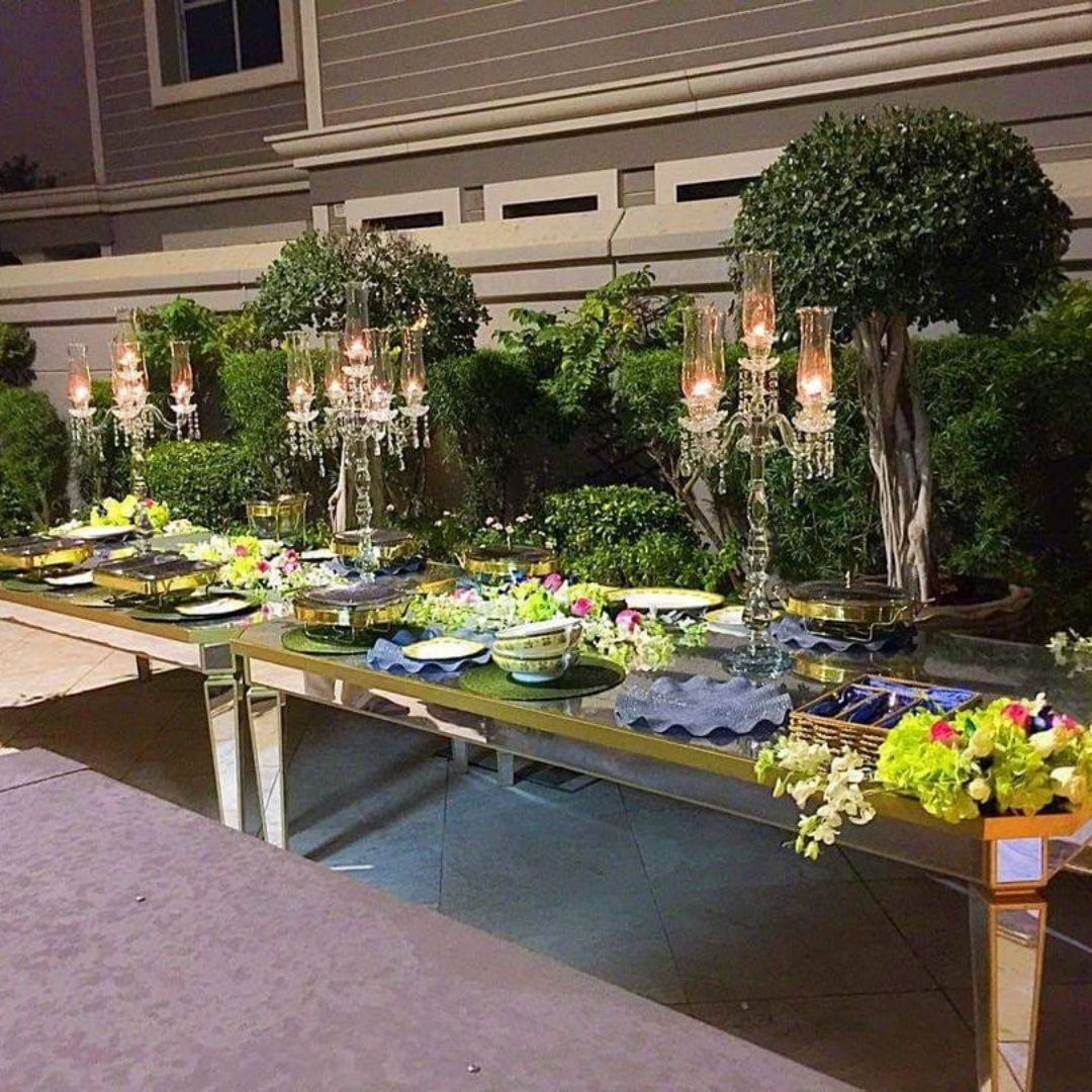 Gold mirror - topped dining table 8-10 people